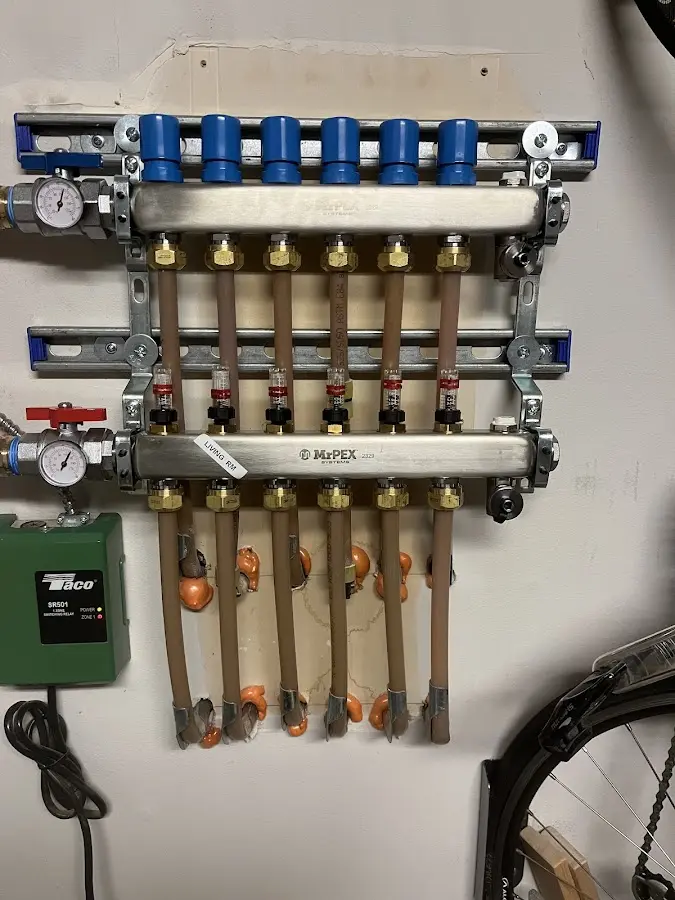 Plumber performing Gas Line Installation at a residential property in Winchester