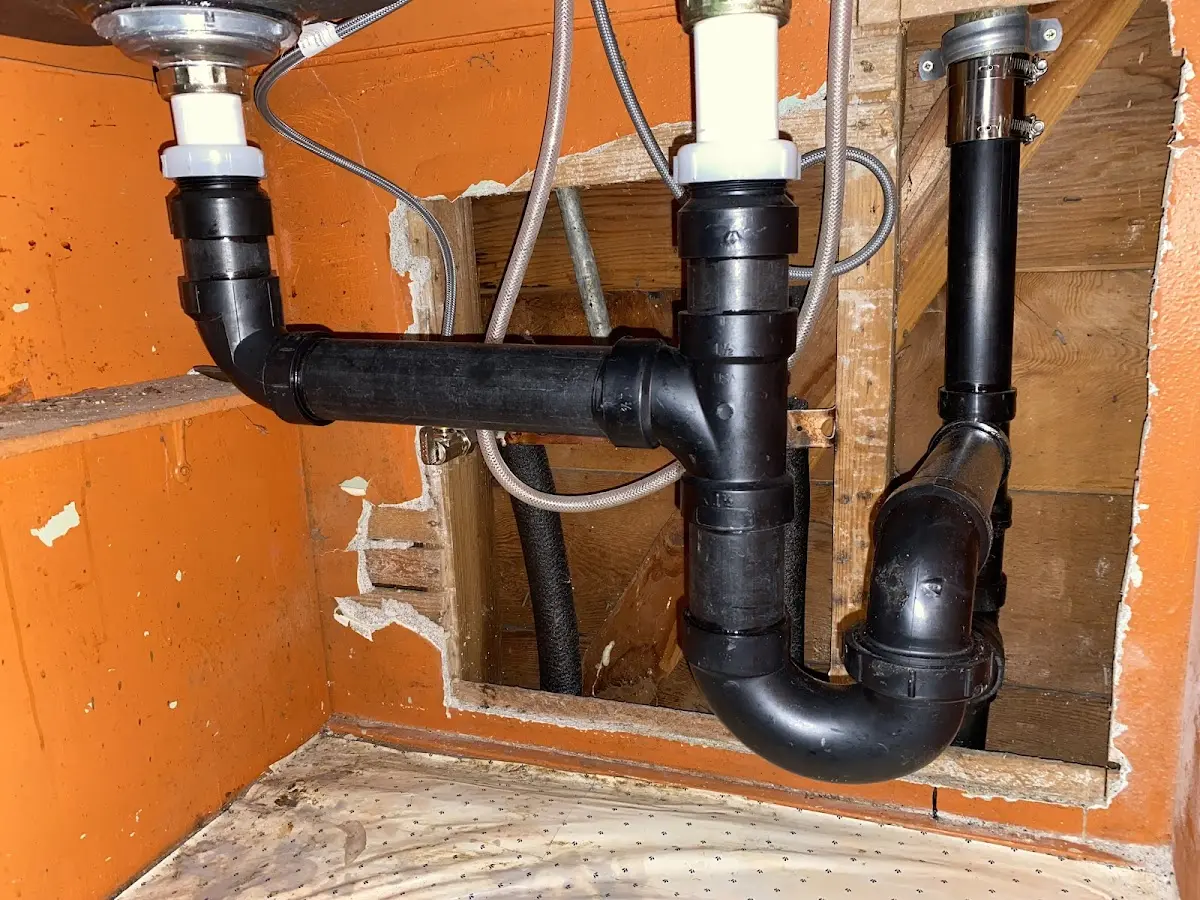 Professional Garbage Disposal Repair equipment and tools on the job in Winchester